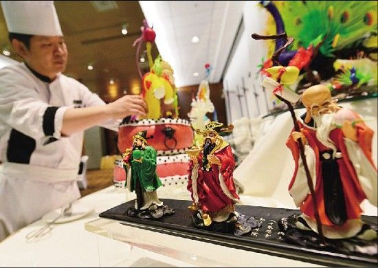 APEC服务餐厅现兵马俑等中国元素食雕(图)